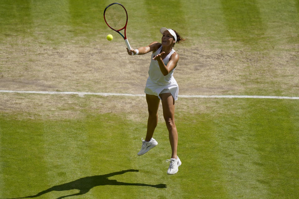 Germany's Tatjana Maria returns to Tunisia's Ons Jabeur in a women's singles semifinal match on day eleven of the Wimbledon tennis championships in London, Thursday, July 7, 2022. (AP Photo/Gerald Herbert)