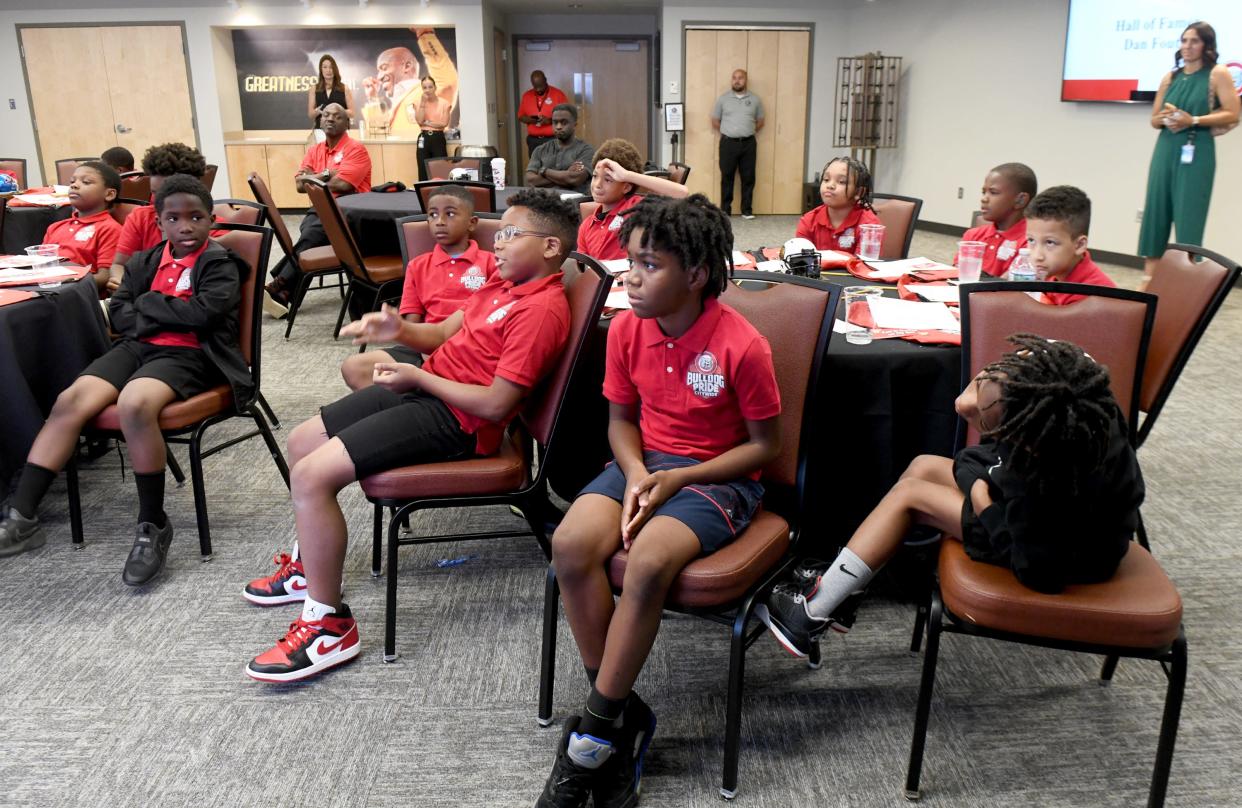 The Future 40, a group of fourth grade Canton City Schools boys, visit the Pro Football Hall of Fame.