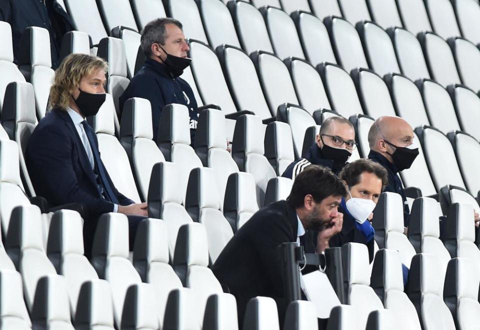 Juventus president Andrea Agnelli (bottom) watches on from the stands.