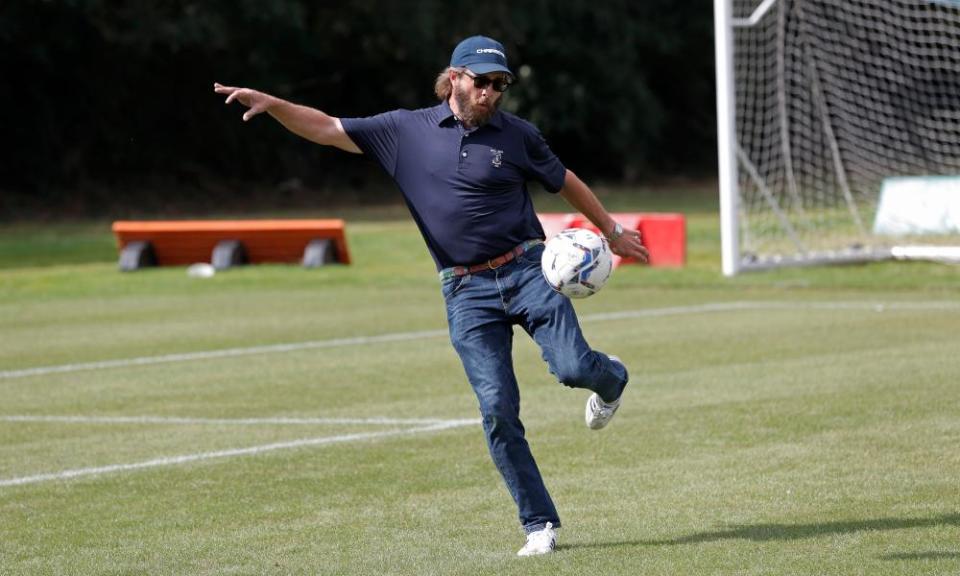 Pete Couhig, Wycombe’s chief financial officer and nephew of the American owner Rob Couhig, practises his shooting.