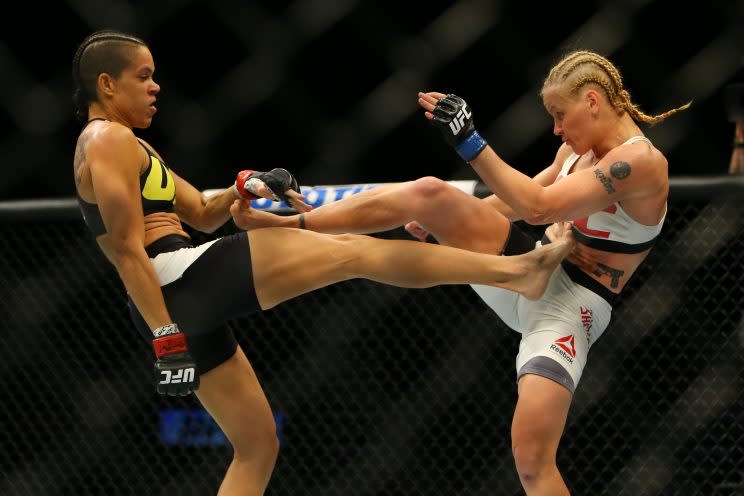 Amanda Nunes (L) and Valentina Shevchenko fight at UFC 196. (Getty Images)