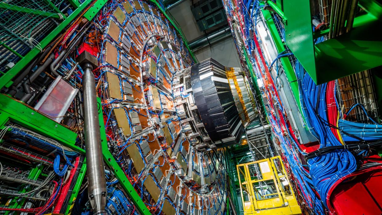  a dense web of wires and magnets in a circular arrangement 