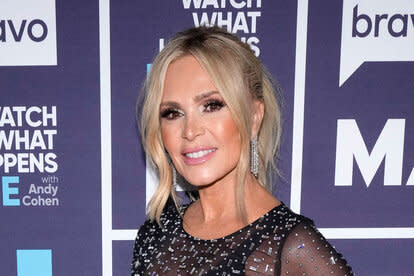 Tamra Judge in front of the step and repeat for WWHL.