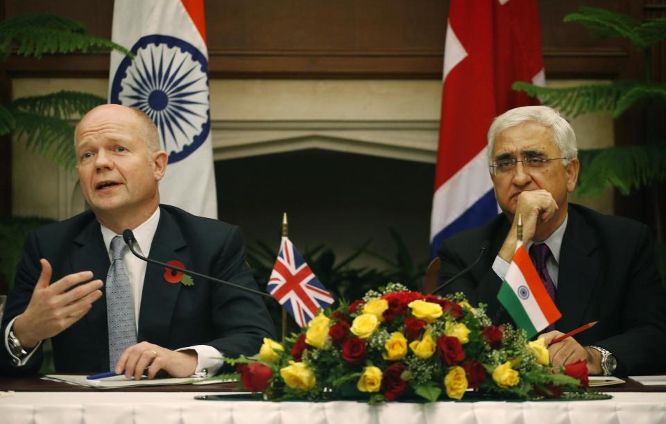 Indian Foreign Minister Salman Khurshid, right, and British Foreign Secretary William Hague, address a joint presser after a meeting in New Delhi, India, Thursday, Nov. 8, 2012. Hague is meeting with top officials in the Indian capital to discuss ways to increase trade and investment and to tackle other issues, including terrorism, cyber security and defense. (AP Photo/Saurabh Das)