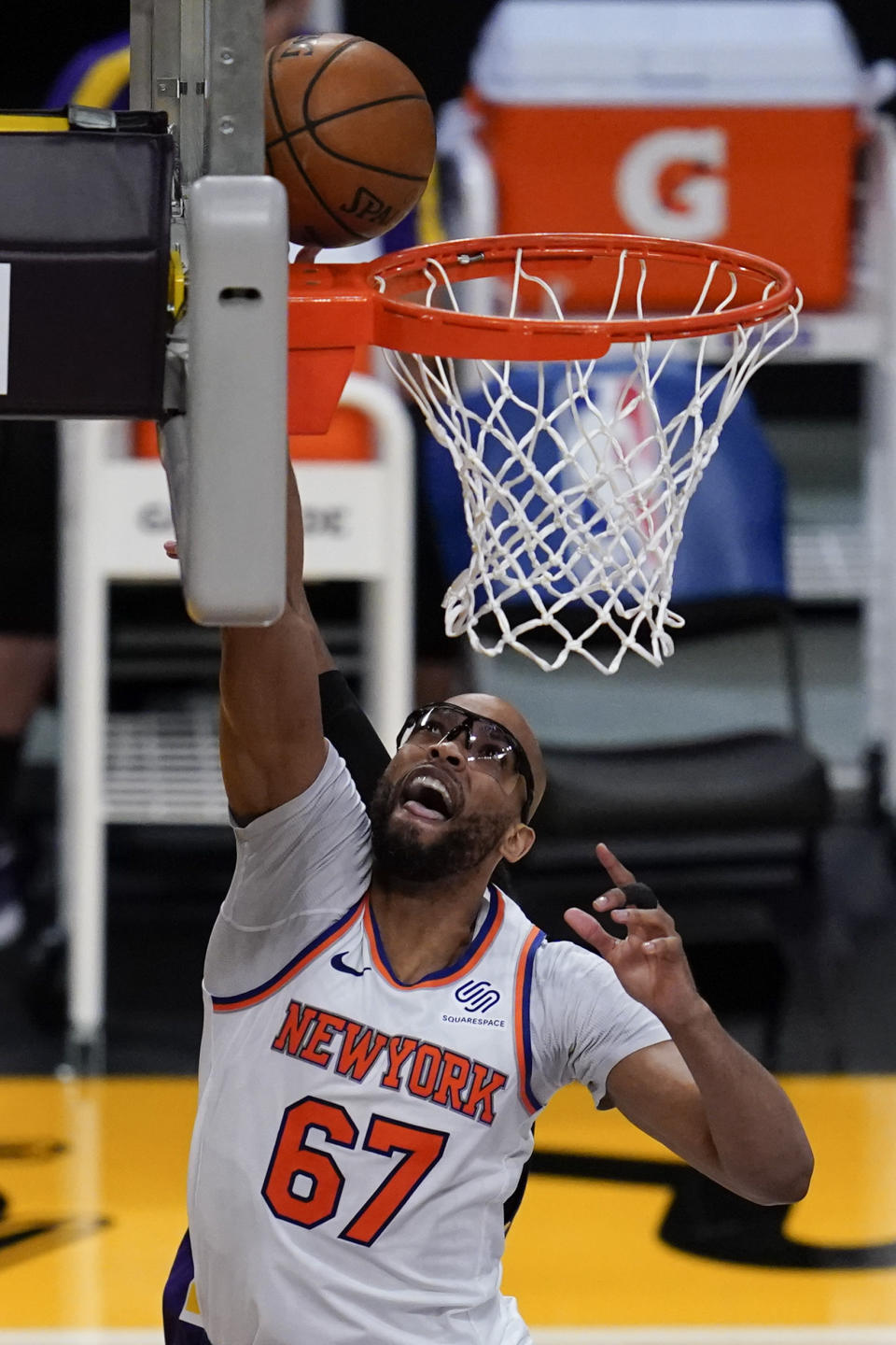 New York Knicks center Taj Gibson (67) shoots during the third quarter of a basketball game against the Los Angeles Lakers Tuesday, May 11, 2021, in Los Angeles. (AP Photo/Ashley Landis)