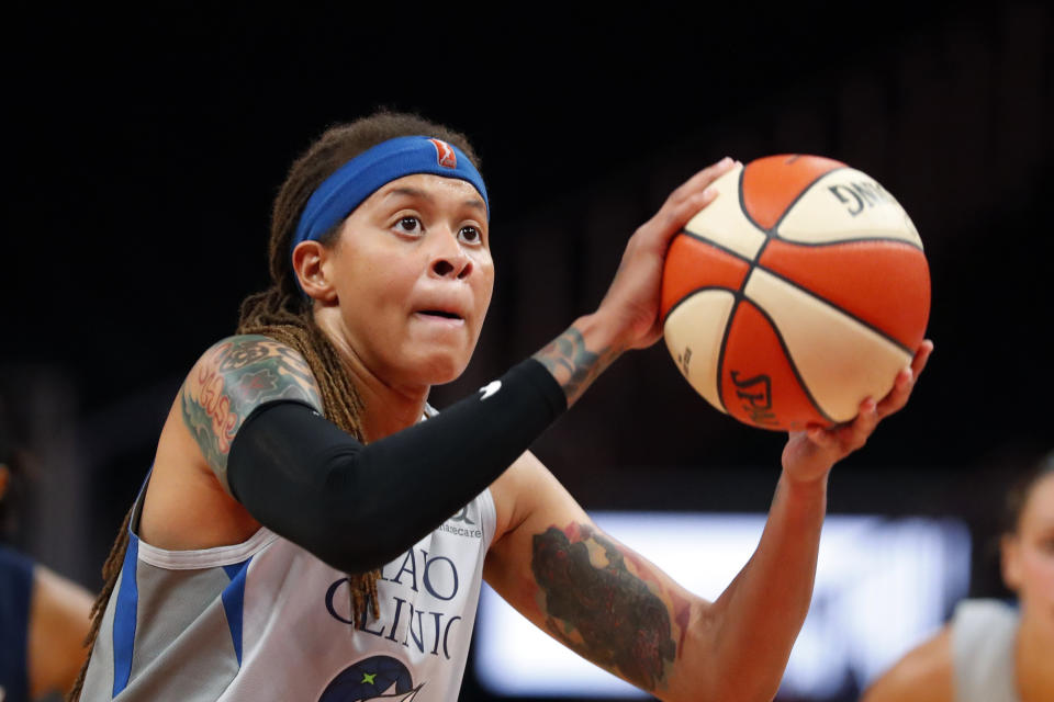 FILE - In this Aug. 6, 2019, file photo, Minnesota Lynx forward Napheesa Collier (24) shoots a free throw during the first half of a WNBA basketball game against the Atlanta Dream, in Atlanta. Collier was named the Associated Press WNBA Rookie of the Year, Wednesday, Sept. 11, 2019. (AP Photo/John Bazemore, File)