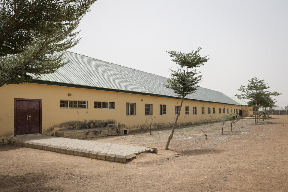 This Saturday, Feb. 27, 2021 photo shows the Government Girls Junior Secondary School from where more than 300 girls were abducted on Friday by gunmen, in Jangebe town, Zamfara state, northern Nigeria. Nigerian police and the military have begun joint operations to rescue the more than 300 girls who were kidnapped from the boarding school, according to a police spokesman. (AP Photo/Ibrahim Mansur)