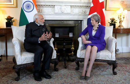 Britain's Prime Minister Theresa May holds a bilateral meeting with Narendra Modi, the Prime Minister of India, at 10 Downing Street in London, April 18, 2018. Kirsty Wigglesworth/Pool via Reuters