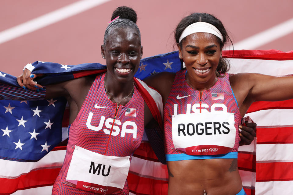 <p>TOKYO, JAPAN - AUGUST 03: Gold medalist Athing Mu of Team United States and bronze medalist Raevyn Rogers of Team United States celebrate after the Women's 800m Final on day eleven of the Tokyo 2020 Olympic Games at Olympic Stadium on August 03, 2021 in Tokyo, Japan. (Photo by Christian Petersen/Getty Images)</p> 