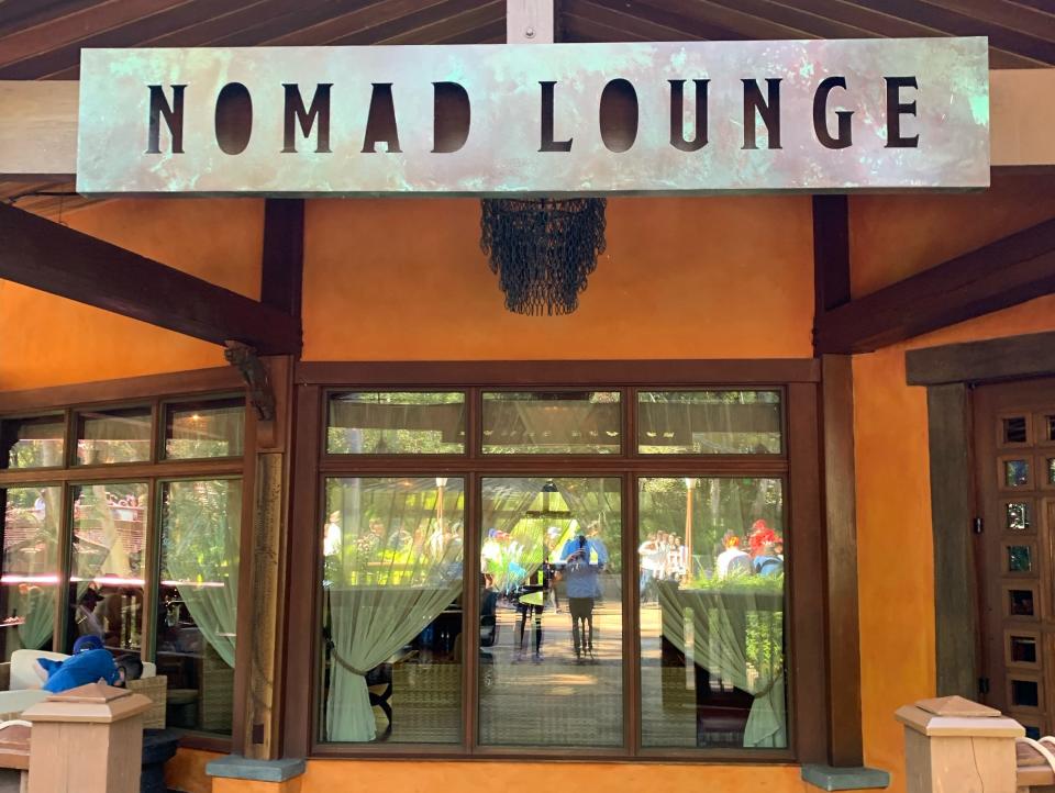 exterior shot of the sign at nomad lounge in animal kingdom