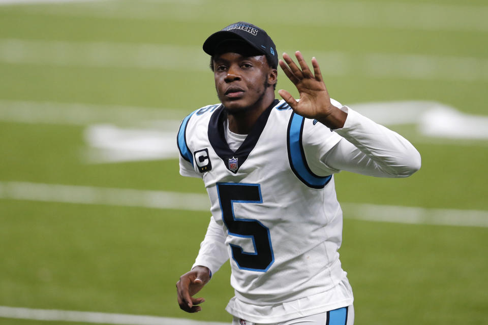 Carolina Panthers quarterback Teddy Bridgewater (5) waves as he runs off the field after an NFL football game against the New Orleans Saints in New Orleans, Sunday, Oct. 25, 2020. The Saints won 27-24. (AP Photo/Brett Duke)