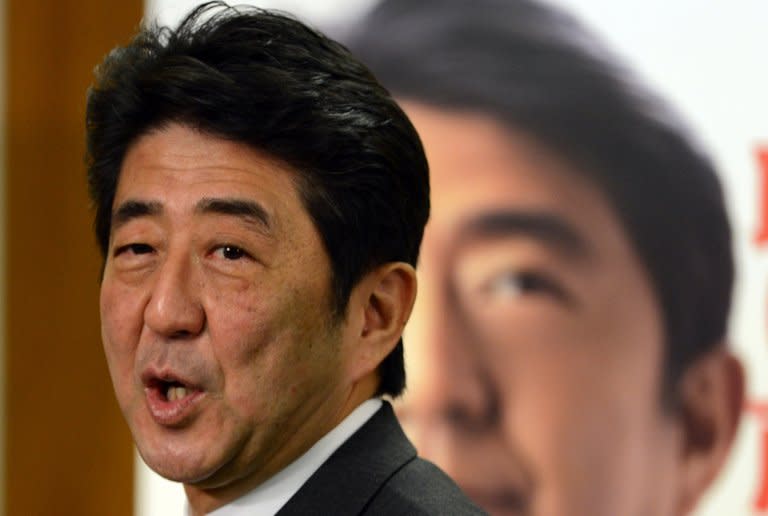 Japan's Liberal Democratic Party (LDP) leader Shinzo Abe, pictured after a press conference at the LDP headquarters in Tokyo, on December 17, 2012. Abe will send a special envoy to China on a fence-mending trip, a report said on Saturday, after he announced plans to dispatch an emissary on a similar mission to South Korea