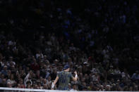 Denmark's Holger Rune celebrates after winning a point against Serbia's Novak Djokovic during their Paris Masters final at the Accor Arena, Sunday, Nov. 6, 2022 in Paris. (AP Photo/Thibault Camus)