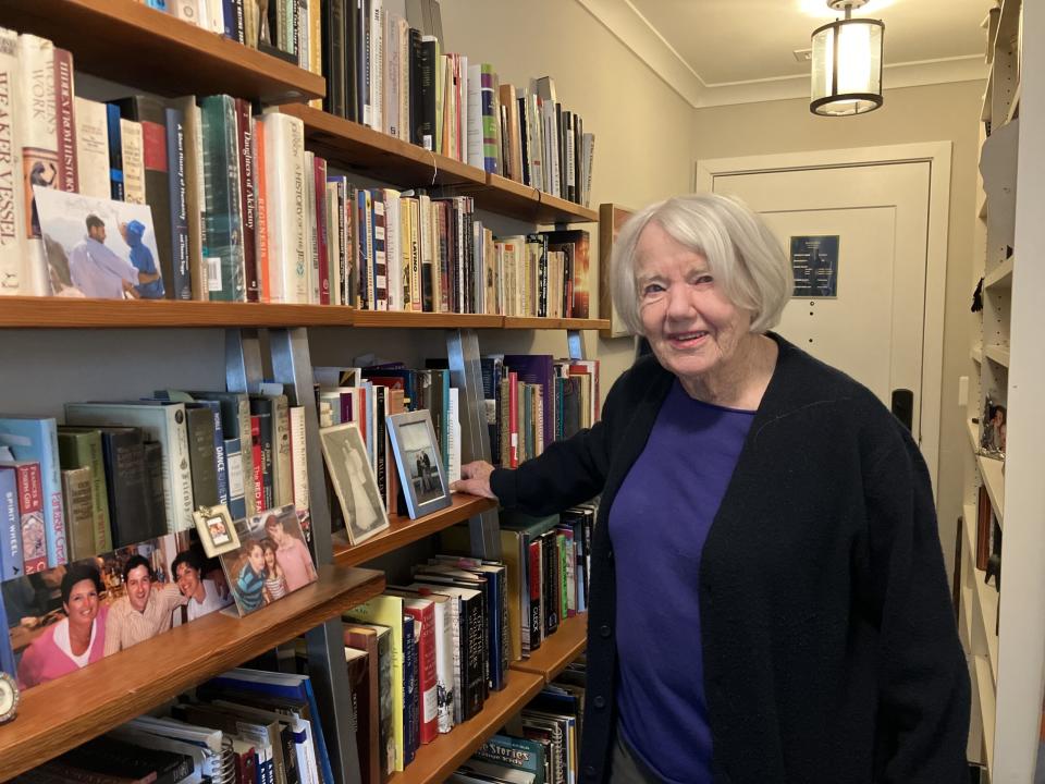 Joy Hakim among a few of the books and memorabilia she has held onto in her Bethesda, Md., apartment. (Greg Toppo)