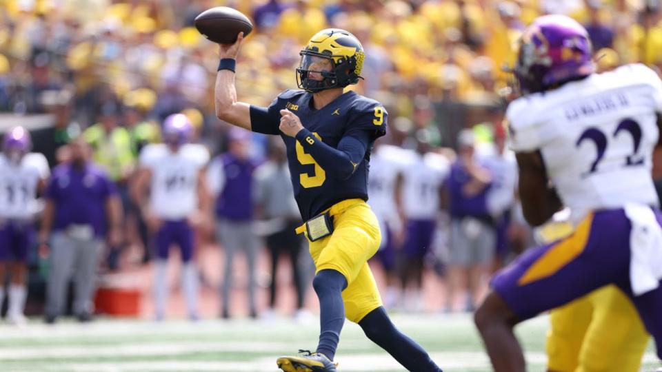 <div>J.J. McCarthy #9 of the Michigan Wolverines throws a first quarter touchdown while playing the East Carolina Pirates at Michigan Stadium on September 02, 2023 in Ann Arbor, Michigan. (Photo by Gregory Shamus/Getty Images)</div>