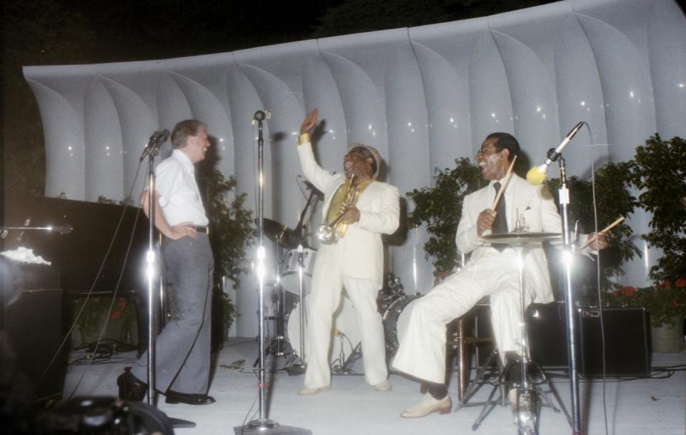 President Jimmy Carter, left, with Dizzy Gillespie and Max Roach at the Newport Jazz Festival.