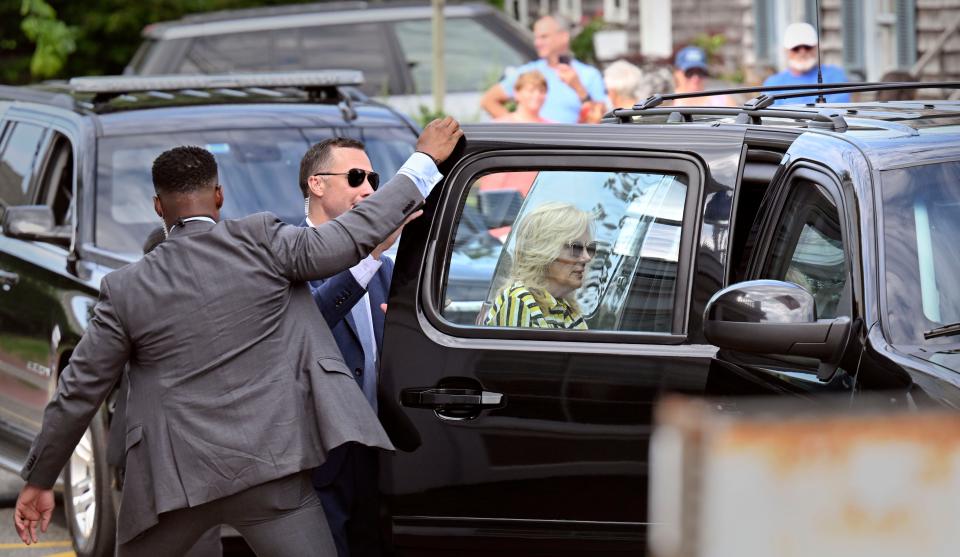 Jill Biden, the first lady of the United States, enters an SUV  on Friday in Provincetown, assisted by Secret Service officials, as she heads to a fundraiser to reelect her husband, President Joe Biden. Jill Biden made a stop at a private home on Commercial Street prior to heading to the fundraiser at the home of Bryan Rafanelli.