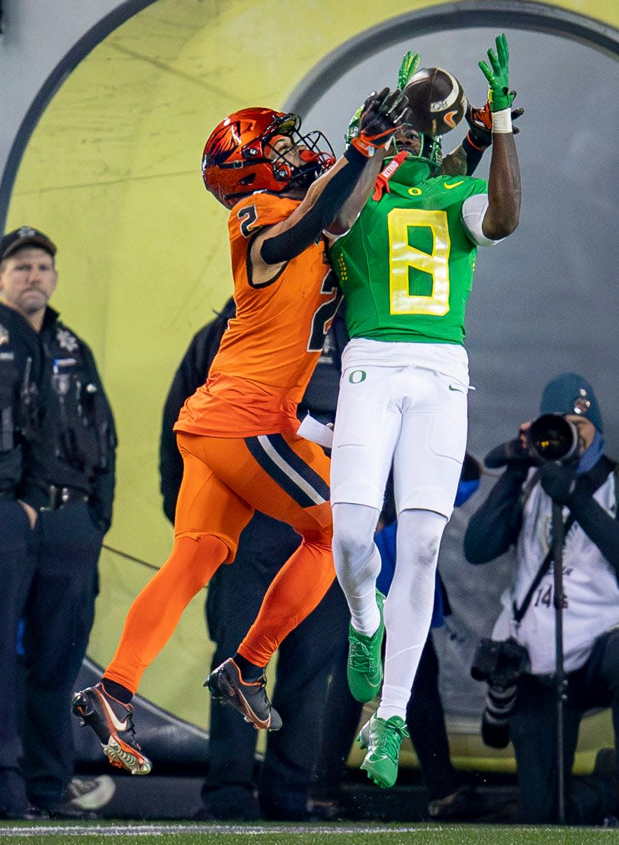 Oregon defensive back Dontae Manning intercepts a pass in the end zone intended for Oregon State wide receiver Anthony Gould as the No. 6 Oregon Ducks take on the No. 16 Oregon State Beavers Friday, Nov. 24, 2023, at Autzen Stadium in Eugene, Ore.