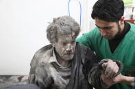 <p>A wounded Syrian man receives medical treatment at a hospital after Assad Regime carried out airstrikes over Arbin town of the Eastern Ghouta region of Damascus which is a de-escalation zone in Syria on Feb. 8, 2018. (Photo: Dia Al-Din/Anadolu Agency/Getty Images) </p>