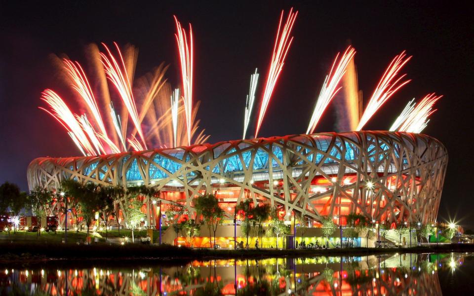 Fireworks explode over the National Stadium, known as the Bird's Nest, during a rehearsal of the opening ceremony for the Beijing 2008 Olympic Games 02 August 2008 - How Hee Young/EPA