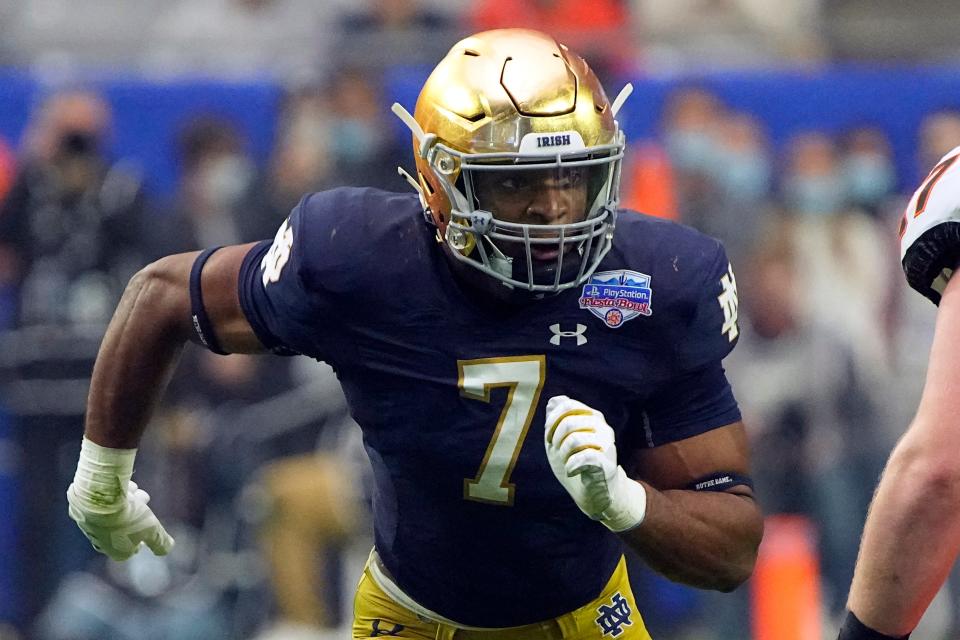 FILE - Notre Dame defensive lineman Isaiah Foskey (7) plays during the second half of the Fiesta Bowl NCAA college football game against Oklahoma State, Saturday, Jan. 1, 2022, in Glendale, Ariz. If Notre Dame is going to beat Ohio State for the first time since 1936, everyone in South Bend knows the defense must ace its test. (AP Photo/Rick Scuteri, File)