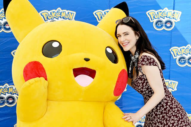 <p>Dave Kotinsky/Getty</p> Rachel Brosnahan poses with Pikachu at Pokemon GO Fest 2024