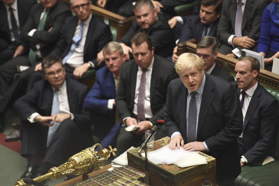 Britain's Prime Minister Boris Johnson speaks during the Brexit debate inside the House of Commons in London Saturday Oct. 19, 2019. At the rare weekend sitting of Parliament, Prime Minister Boris Johnson implored legislators to ratify the Brexit deal he struck this week with the other 27 EU leaders. Lawmakers voted Saturday in favour of the 'Letwin Amendment', which seeks to avoid a no-deal Brexit on October 31. (Jessica Taylor/House of Commons via AP)