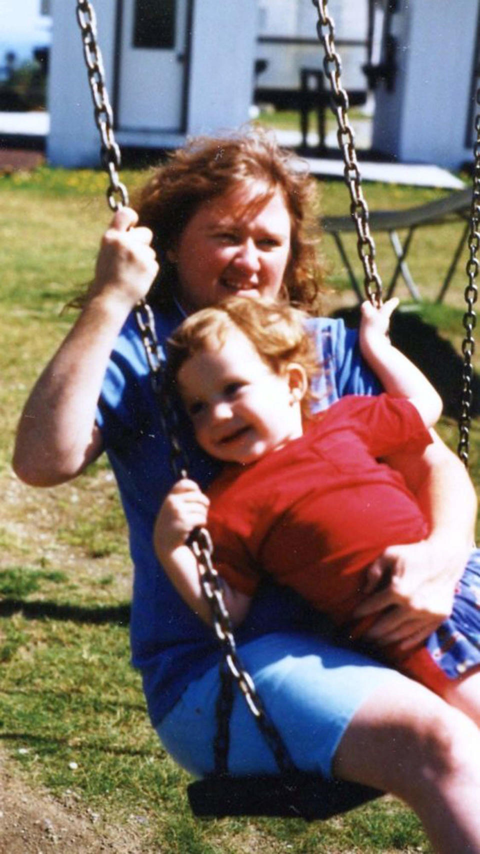 Dr. Kerry Magro as a child swinging in his mothers lap outside (Courtesy Dr. Kerry Magro)