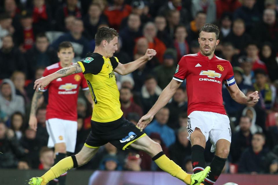 Healthy | Michael Carrick (right) says he had an irregular heart rhythm: Man Utd via Getty Images