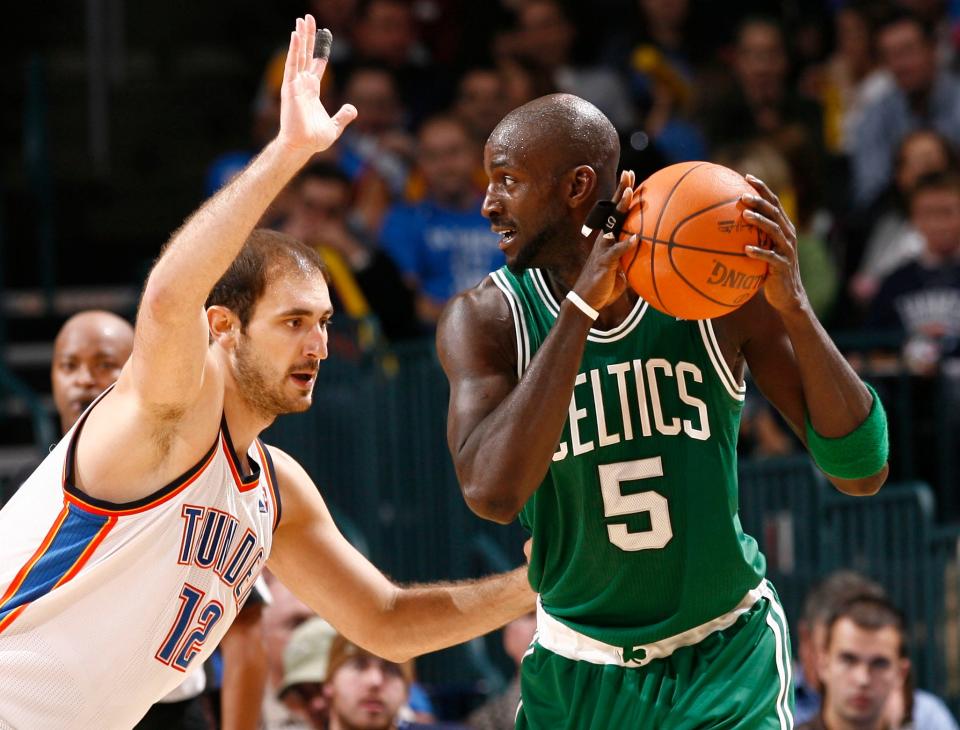 Former Thunder center Nenad Krstic defends Kevin Garnett in a 2010 game.