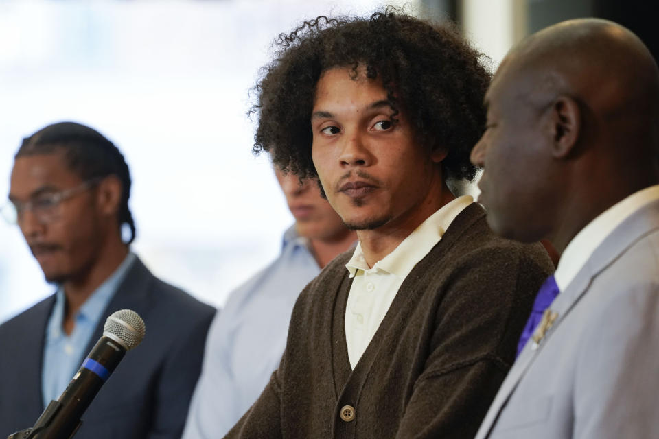 Standing with other former Northwestern athletes, former Northwestern football player Simba Short speaks during a press conference addressing widespread hazing accusations at Northwestern University Wednesday, July 19, 2023, in Chicago. (AP Photo/Erin Hooley)