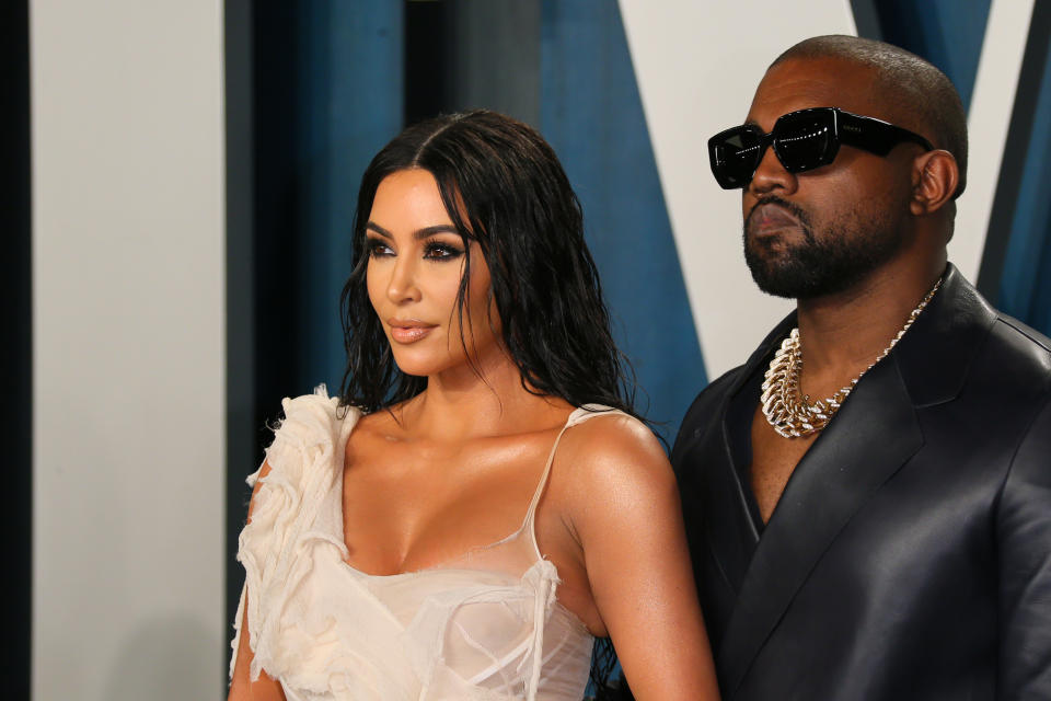 US media personality Kim Kardashian (L) and husband US rapper Kanye West attend the 2020 Vanity Fair Oscar Party following the 92nd Oscars at The Wallis Annenberg Center for the Performing Arts in Beverly Hills on February 9, 2020. (Photo by Jean-Baptiste Lacroix / AFP) (Photo by JEAN-BAPTISTE LACROIX/AFP via Getty Images)