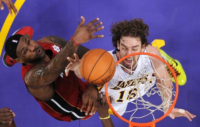 Los Angeles Lakers center Pau Gasol (16) of Spain, and his brother and  Memphis Grizzlies center Marc Gasol (33) jockey for position during the  first half of an NBA basketball game in