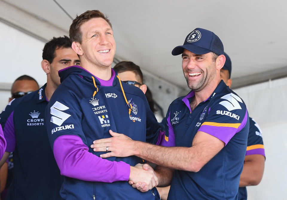 Ryan Hoffman and Cameron Smith have a laugh during the Melbourne Storm Fan Day.