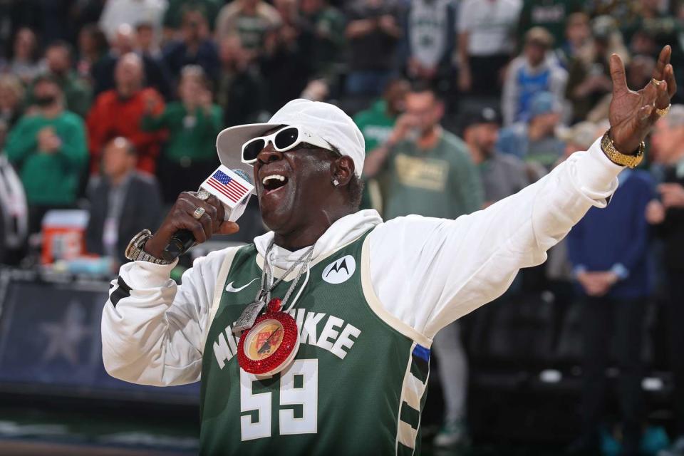 <p>Gary Dineen/NBAE via Getty</p> Flavor Flav performs at the Hawks vs. Bucks game on Oct. 29, 2023