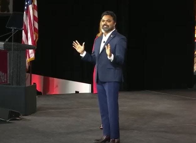 Newly elected Texas Republican Party Chairman Abraham George addresses the delegates Saturday at the state GOP convention in San Antonio. The delegates adopted a 50-page platform that reinforces the party's accelerated move to the right.