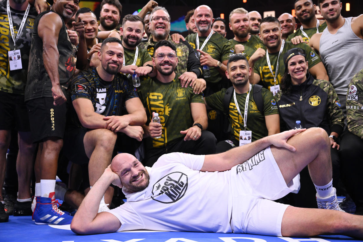 RIYADH, SAUDI ARABIA - OCTOBER 25: Tyson Fury poses for a photo with his team and Joseph Parker following a public workout ahead of the Tyson Fury v Francis Ngannou boxing match at Boulevard Hall on October 25, 2023 in Riyadh, Saudi Arabia. (Photo by Justin Setterfield/Getty Images)