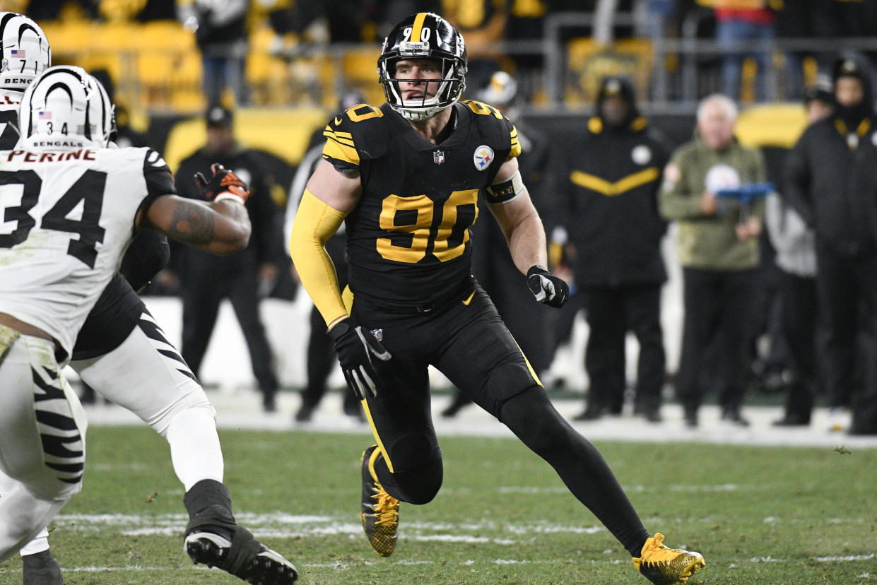Pittsburgh Steelers linebacker T.J. Watt (90) plays against the Cincinnati Bengals during the first half of an NFL football game, Sunday, Nov. 20, 2022, in Pittsburgh. (AP Photo/Don Wright)