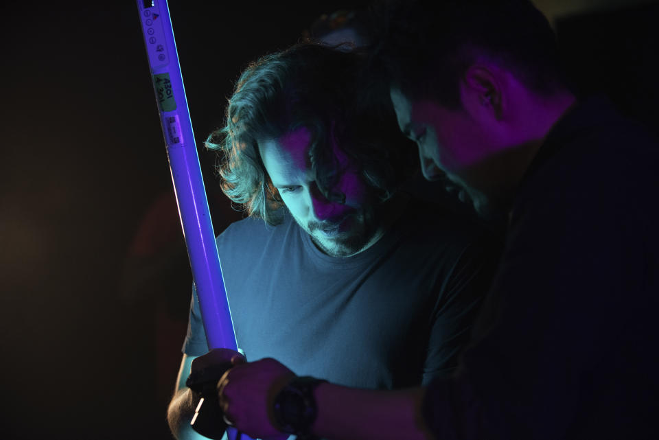 This image released by Focus Features shows director Edgar Wright, left, and cinematographer Chung-hoon Chung on the set of "Last Night in Soho." (Parisa Taghizadeh/Focus Features via AP)