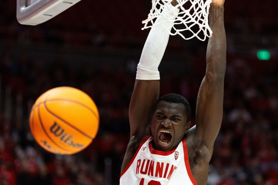 Utah Utes center Keba Keita (13) reacts after dunking the ball during a men’s college basketball game between the University of Utah and Washington State University at the Jon M. Huntsman Center in Salt Lake City on Friday, Dec. 29, 2023. | Megan Nielsen, Deseret News