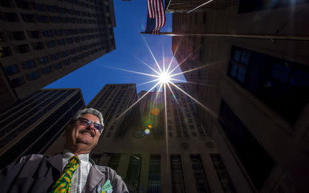 Glenn Hollander, a partner at Hollander and Feuerhaken, poses for a photo outside the Chicago Board of Trade building in Chicago, Illinois, United States, June 23, 2015. REUTERS/Jim Young