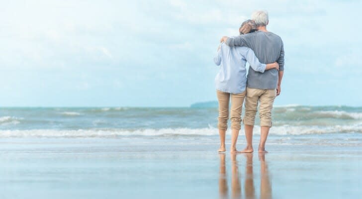 Retired couple on the beach