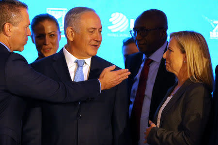 Israeli Prime Minister Benjamin Netanyahu stands next to U.S. Secretary of Homeland Security Kirstjen Nielsen during the International Homeland Security Forum conference in Jerusalem, June 14, 2018. REUTERS/Ammar Awad