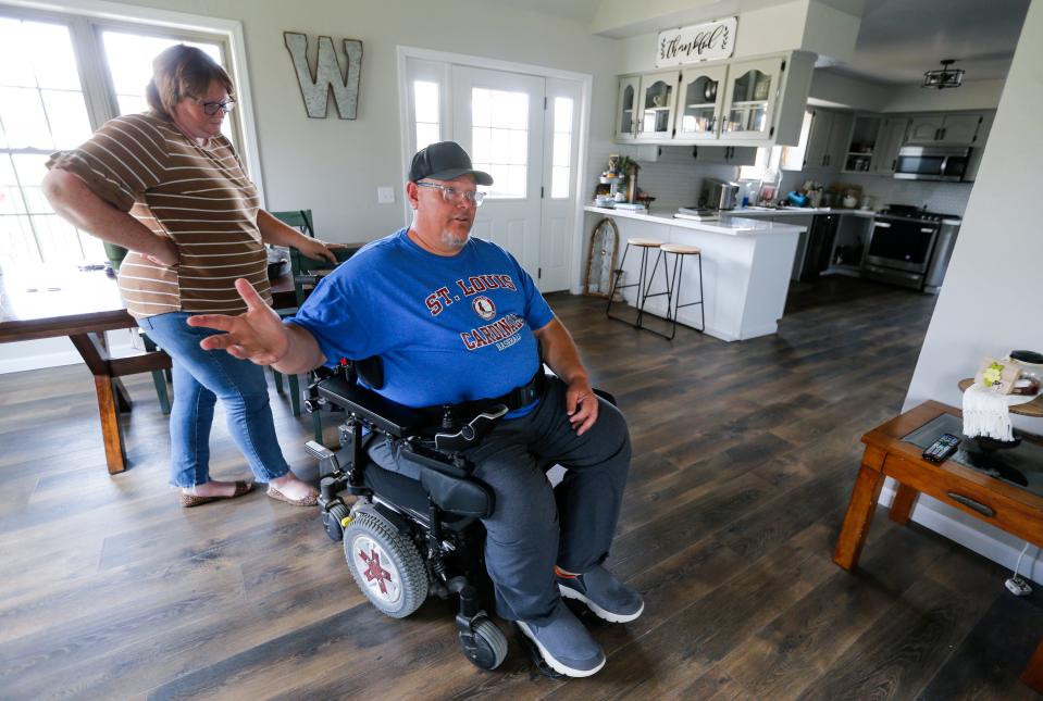 Jason Wendlandt and his wife Ashley at their home in Long Lane.