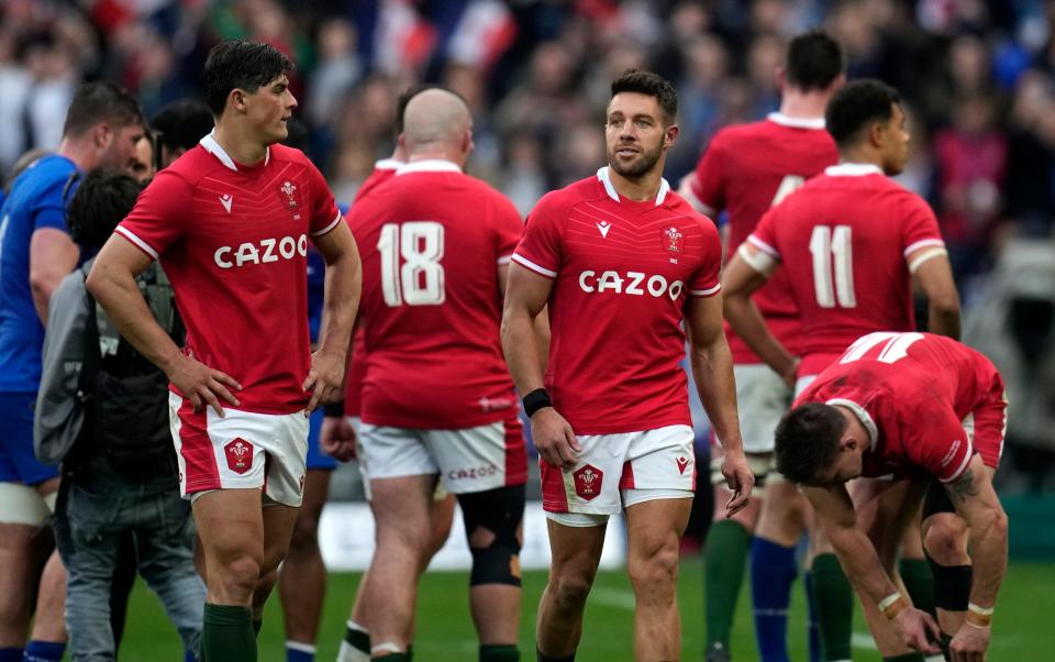 Wales players after the defeat to France - Ieuan Evans: 'Welsh rugby must stop taking massive liberties it can ill afford' - AP/Christophe Ena