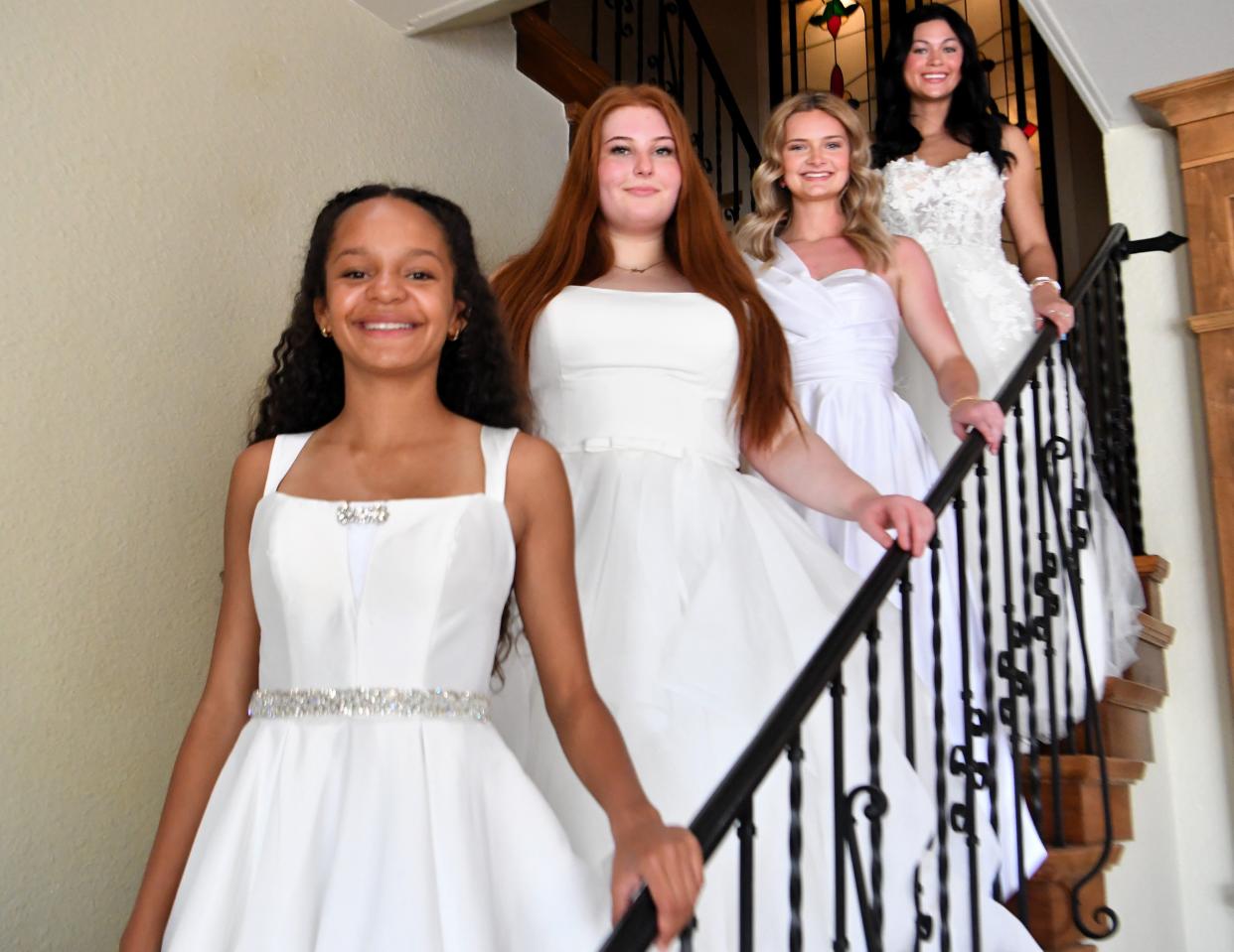 These Junior Forum debutantes shown at The Forum are, top to bottom, Presley Murray, Mari-Lee Osborn, Aryana Parvari and Annabella Pillow, at the Woman's Forum.