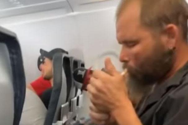 A passenger lit a cigarette and starting smoking on a flight in the US, despite the practice being banned for the past two decades.The man, who had boarded a Spirit Airlines flight to Minneapolis, Minnesota, was filmed by a fellow traveller.The passenger, dressed in a dark shirt and cargo shorts, was filmed by a passenger sitting in the window seat of the same row. The smoker was sitting in an aisle seat.Oblivious to other passengers, he lights up and draws on the cigarette, before leaning back against his seat with his eyes shut.In the footage, a passenger in the row opposite is seen looking around before pressing the call button to flag a flight attendant.A cabin crew member comes over and taps the man, putting his cigarette out.The smoker appears startled, saying “oh my God,” as the flight attendant informs him what he’s doing is illegal and demands to see a boarding pass.The Independent has contacted Spirit Airlines for comment.Smoking has been banned for passengers on all international flights since 2000. In January, China finally outlawed smoking in the cockpit on domestic flights.