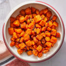 <p>Butternut squash gets tender with slightly crispy edges when it's cooked in the air fryer. The simple seasonings here complement the subtle sweetness from the squash. Serve this quick and easy side dish with just about anything, from roast chicken to pork. <a href="https://www.eatingwell.com/recipe/7910376/air-fryer-butternut-squash/" rel="nofollow noopener" target="_blank" data-ylk="slk:View Recipe;elm:context_link;itc:0;sec:content-canvas" class="link ">View Recipe</a></p>