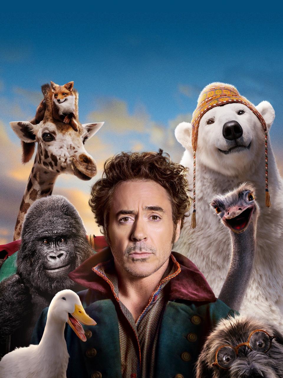 Robert Downey Jr. as Dr. John Dolittle, and the animals in Dolittle. 