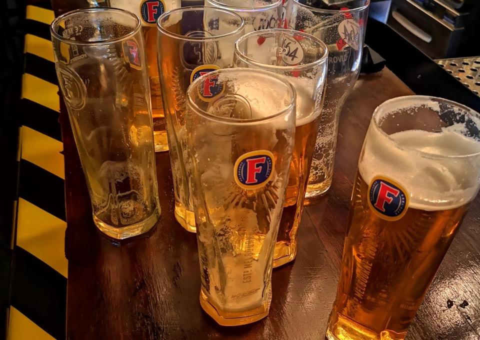 Officers posted a picture of the pint glasses after breaking up a gathering in a pub in Dalston. (Met Police)
